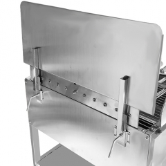 Outdoor barbecue with wind deflector stainless steel Cyprus-style rotisserie barbecue grill.